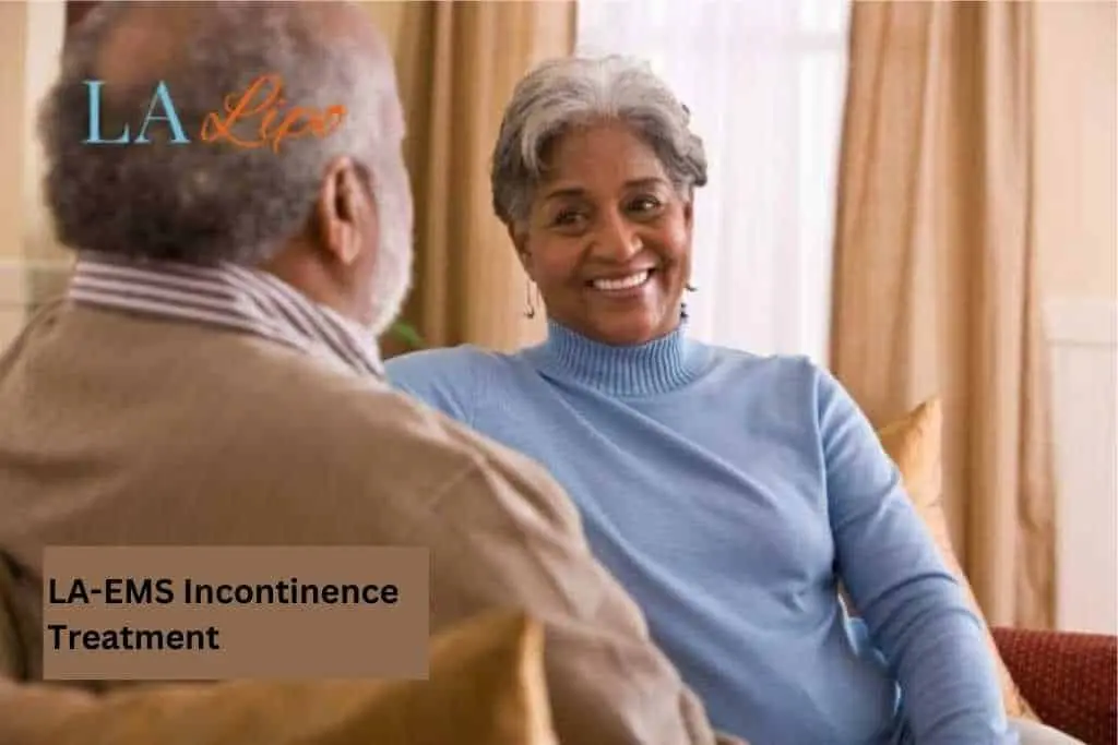 Couple sat smiling at each other - LA-EMS treatment Somerset